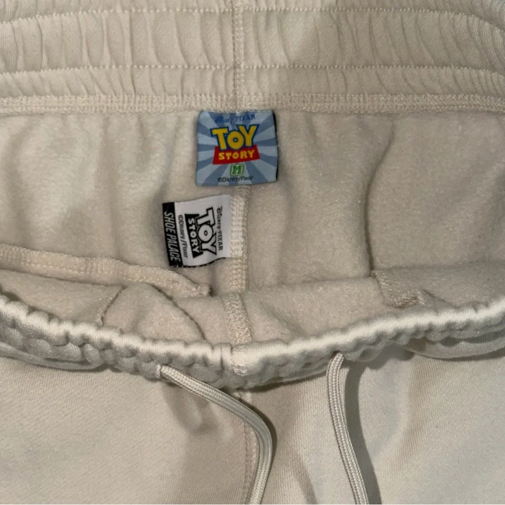 Disney Pixar Toy Story Sweatpants Mens Size M Joggers Woody‎ Buzz Rex Cream